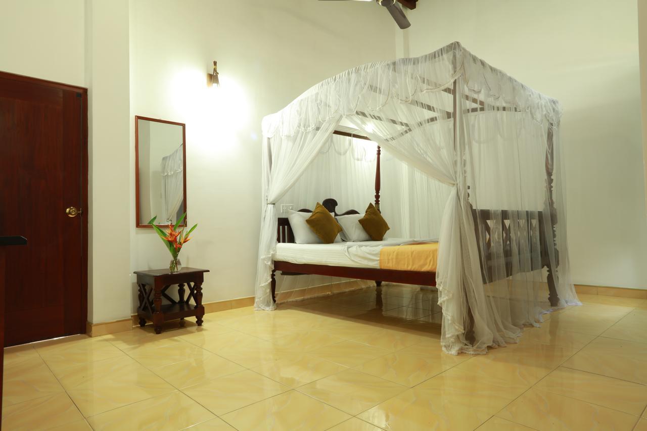 אונה ואטונה Flamingo Guest House חדר תמונה